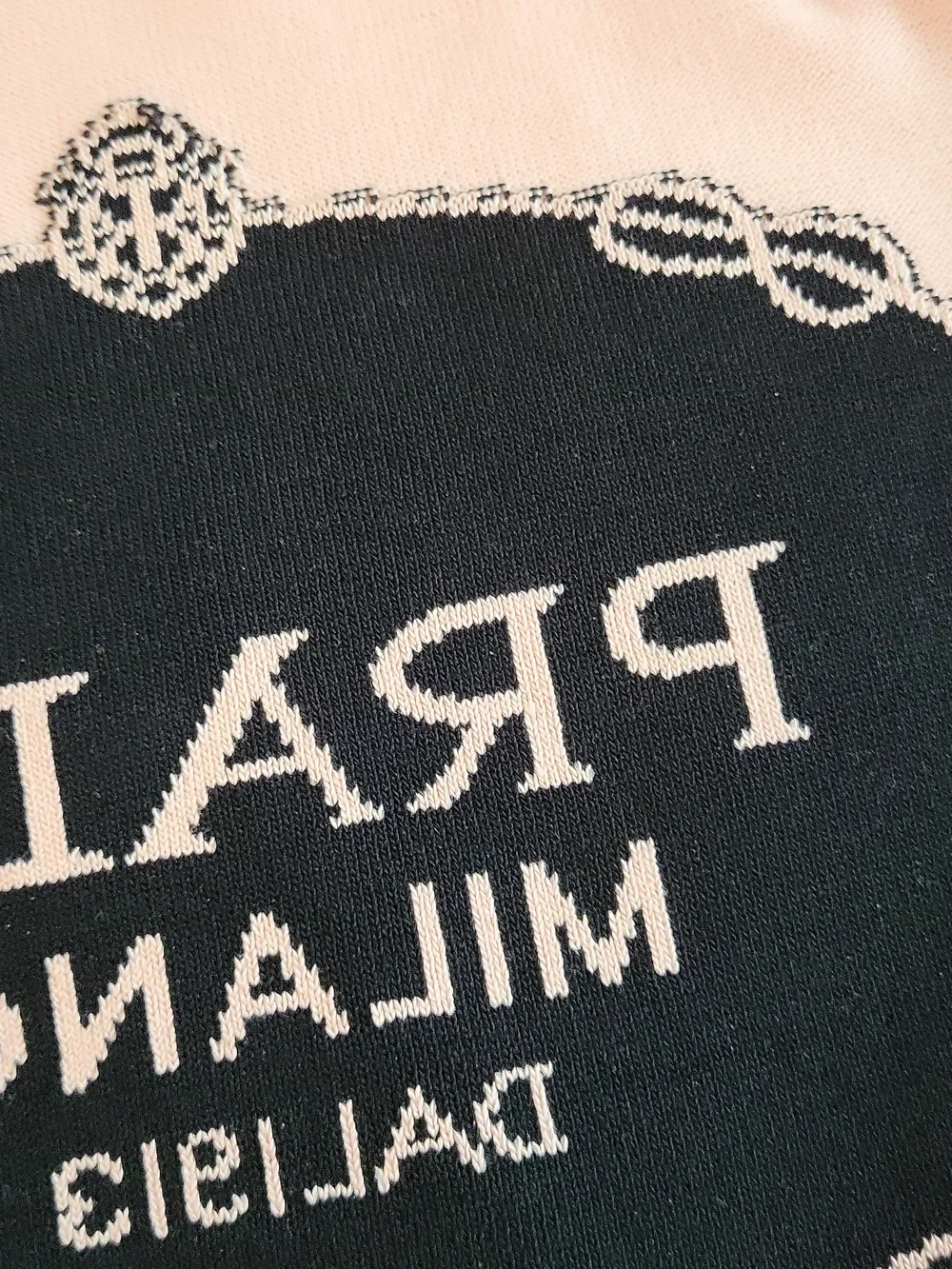 Prada Pink Logo Short-Sleeve Knit Top 20 Across 21 Up & down - Picture 9 of 12